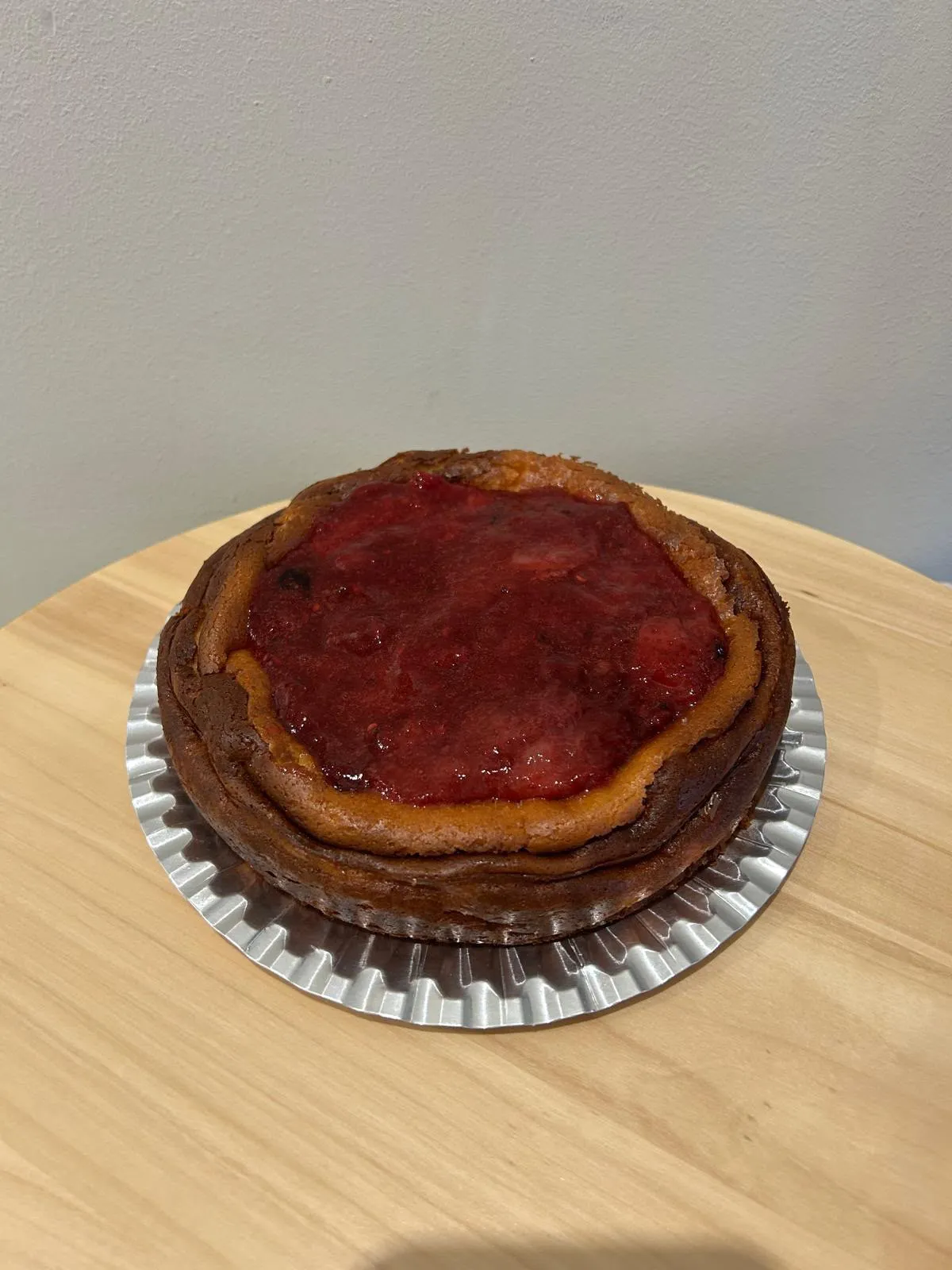 Cheesecake amb coulis de maduixa